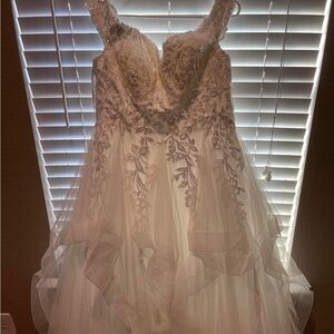 Brand new dress , never used , bought to use as a backup wedding dress